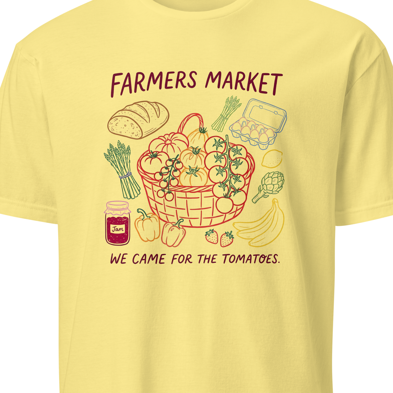 Yellow t-shirt with a farmers market graphic and text
