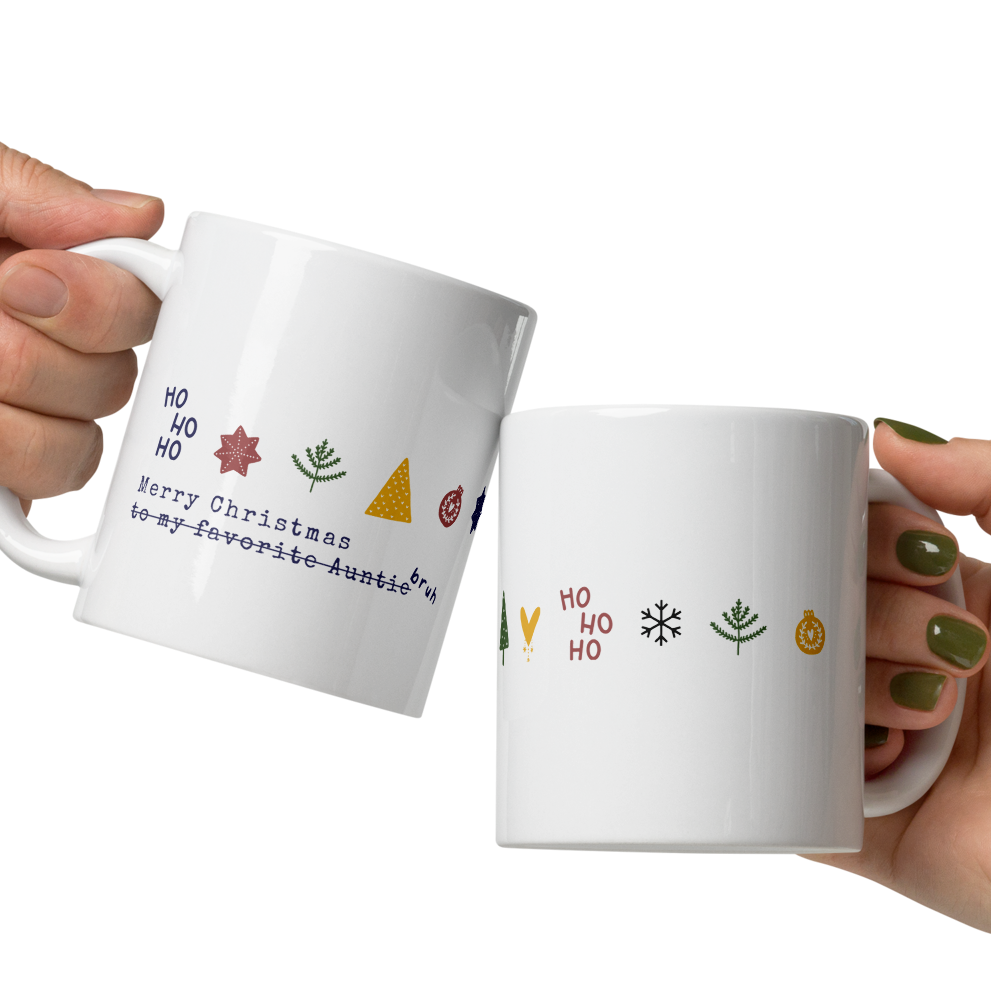 Two hands holding white mugs with colorful designs and text on a white background