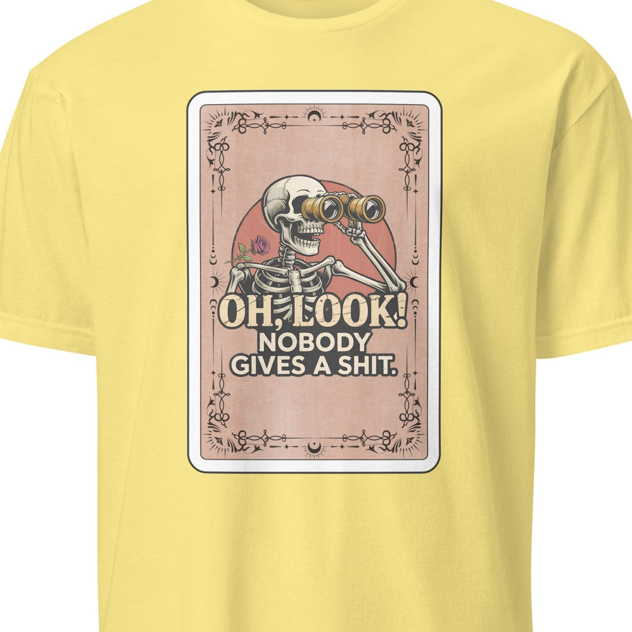 Yellow t-shirt with a graphic design featuring a skeleton and text on a white background
