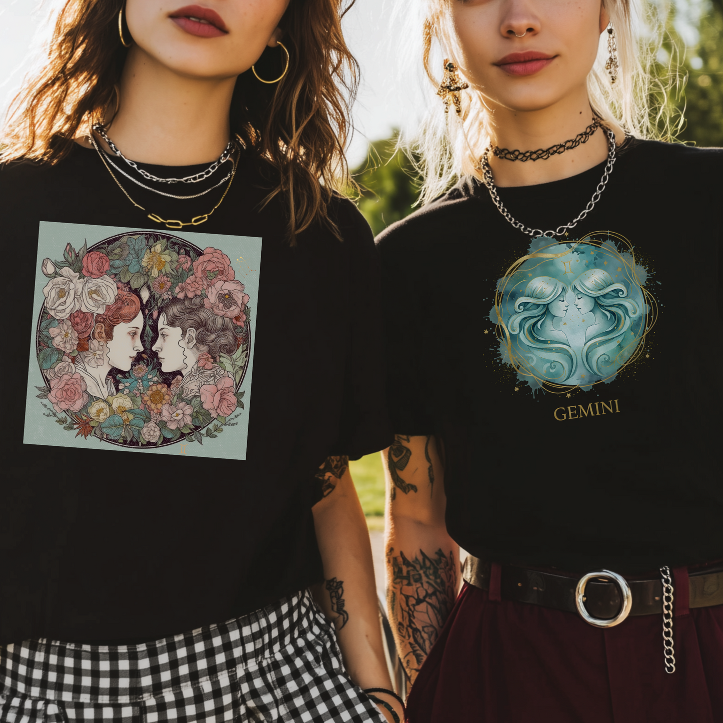 Two people wearing black t-shirts with artistic designs, one featuring flowers and faces, the other with a blue design and 'Gemini' text.
