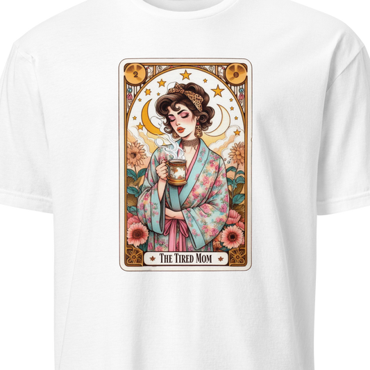 White t-shirt with a graphic of a woman holding a cup and text 'The Tired Mom'
