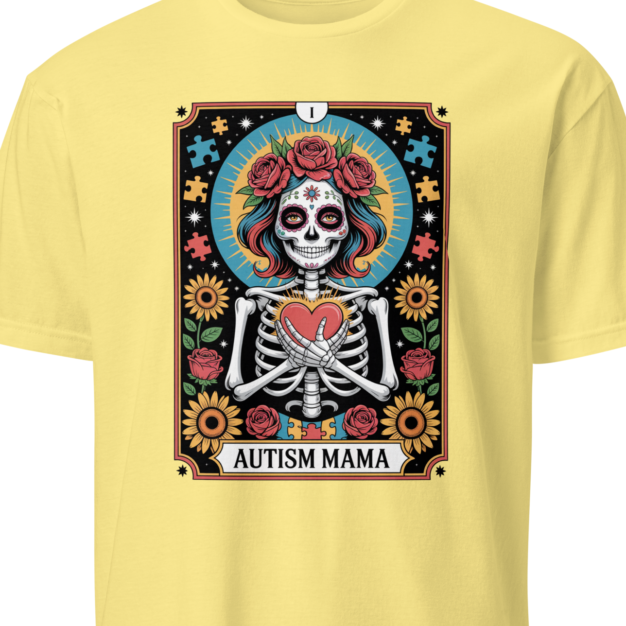 Yellow t-shirt with a colorful graphic design featuring a skeleton and 'Autism Mama' text 