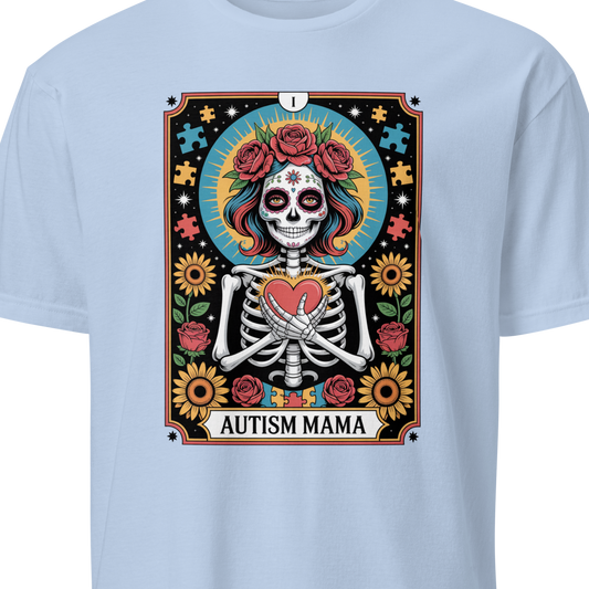 Light blue t-shirt with a colorful graphic design featuring a skeleton and text 'Autism Mama' 