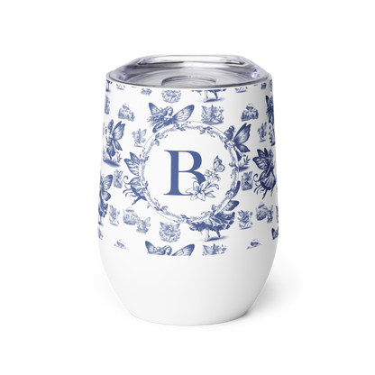 White tumbler with blue butterfly pattern and letter 'B' on a white background