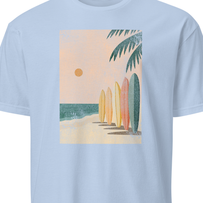 Light blue t-shirt with a graphic of surfboards and a palm tree 