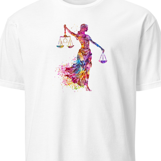 White t-shirt with a colorful graphic of a woman holding scales on a white background