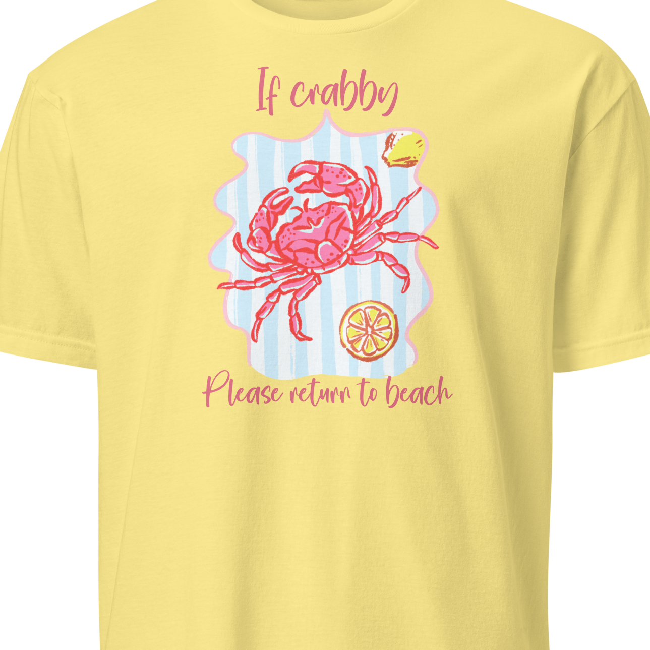 Yellow t-shirt with a pink crab graphic and text 