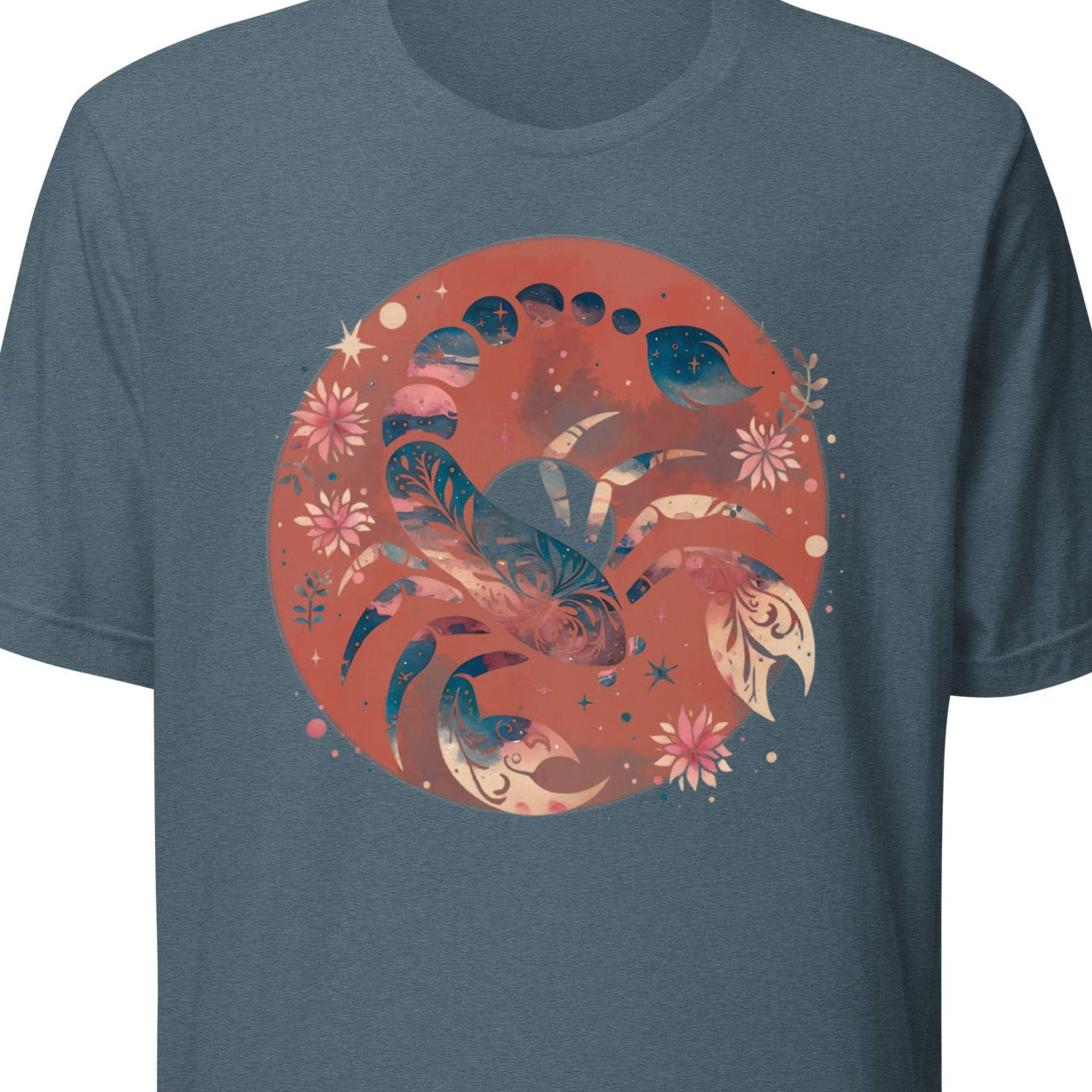Blue t-shirt with a circular graphic design featuring a scorpion and floral elements