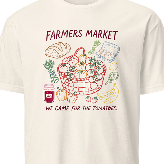 White t-shirt with a graphic of a farmers market basket and text 