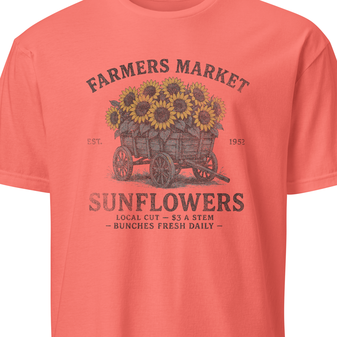 Coral t-shirt with sunflower graphic and text 