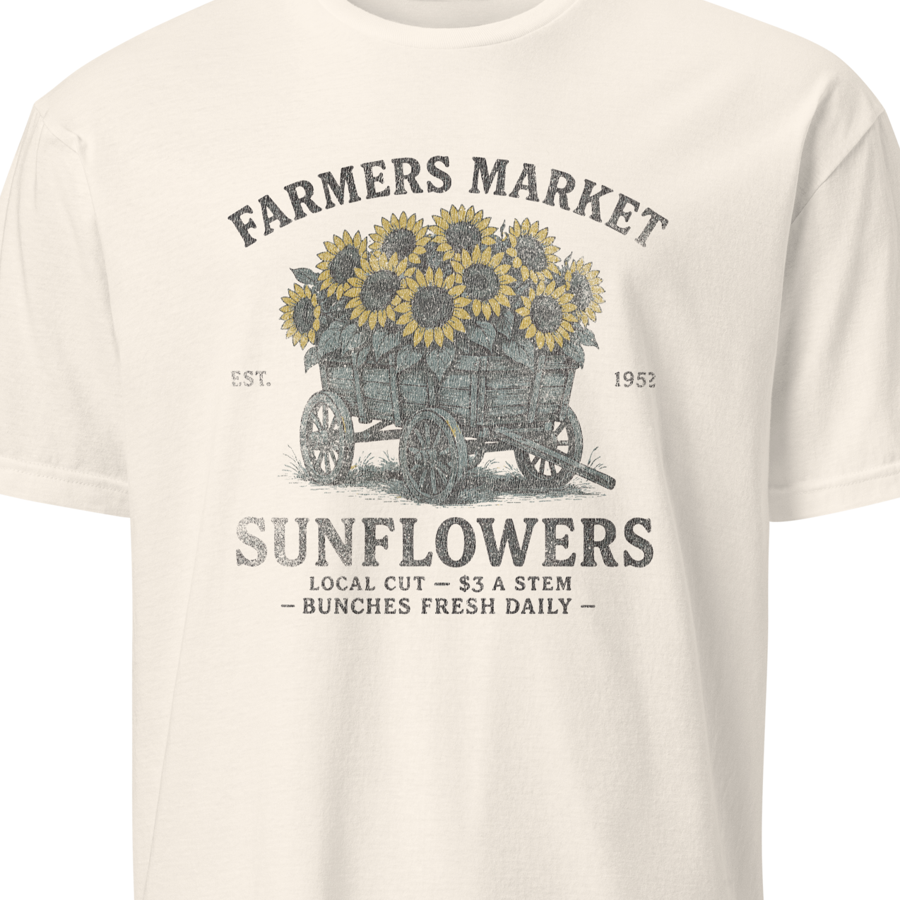 Light blue t-shirt with sunflower graphic and text 