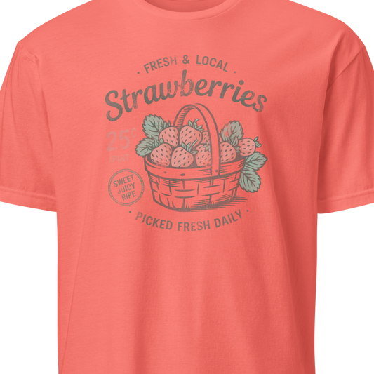 Coral t-shirt with strawberry graphic and text on a white background