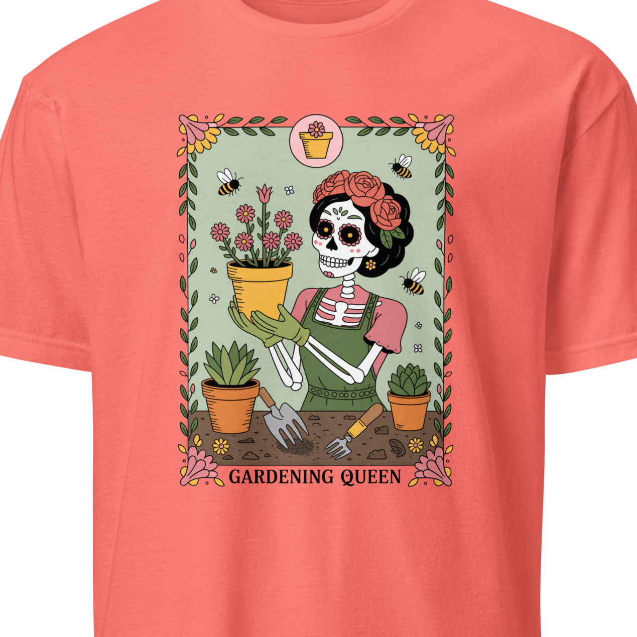 Coral t-shirt with a graphic of a skeleton gardening and the text 'Gardening Queen' 