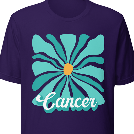 Purple t-shirt with a turquoise flower design and 'Cancer' text