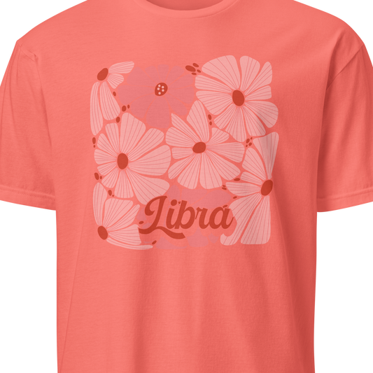 Coral t-shirt with floral design and 'Libra' text on a white background