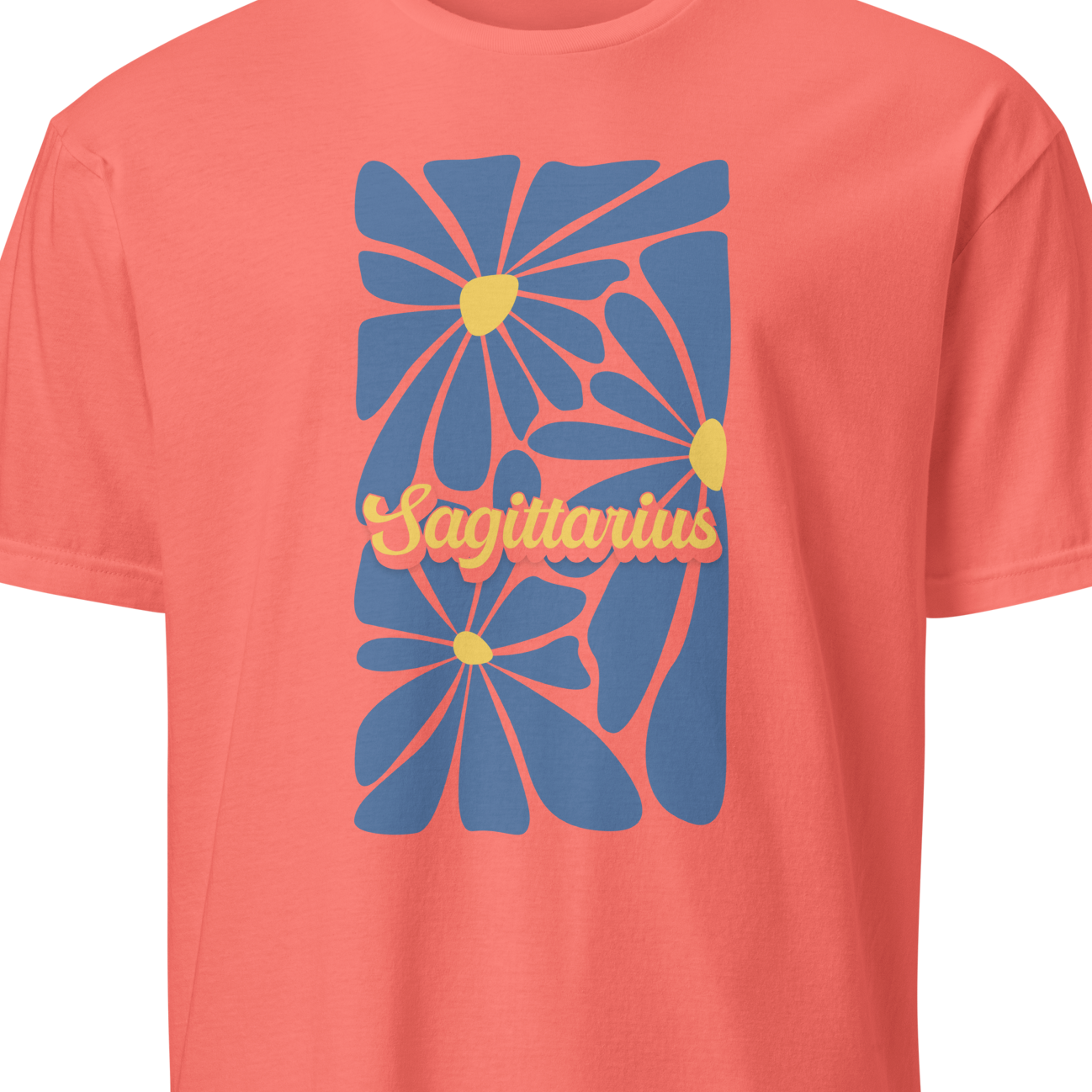 Coral t-shirt with blue floral design and 'Sagittarius' text on a white background