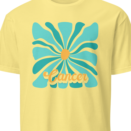 Yellow t-shirt with a blue floral design and 'Cancer' text on a white background