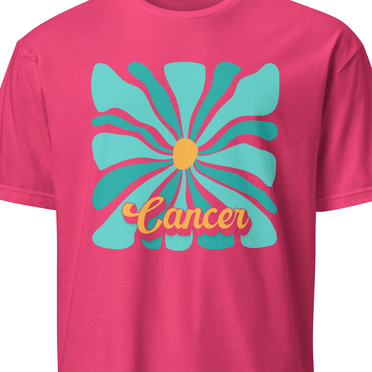 Pink t-shirt with a turquoise flower design and 'Cancer' text on a white background