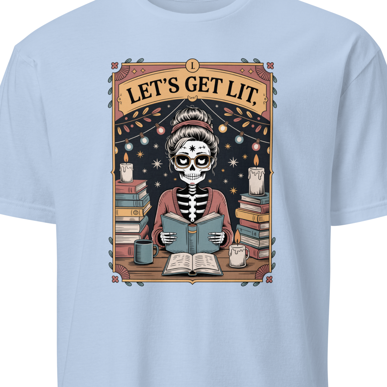 Light blue t-shirt with a skeleton reading a book graphic and 'Let's Get Lit' text 