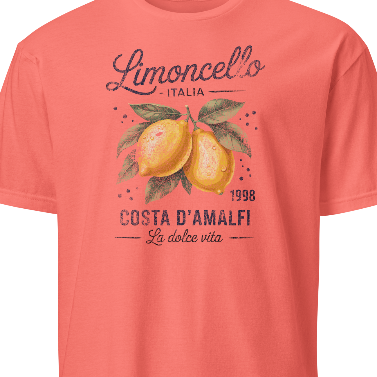 Coral t-shirt with lemon graphic and text on a white background
