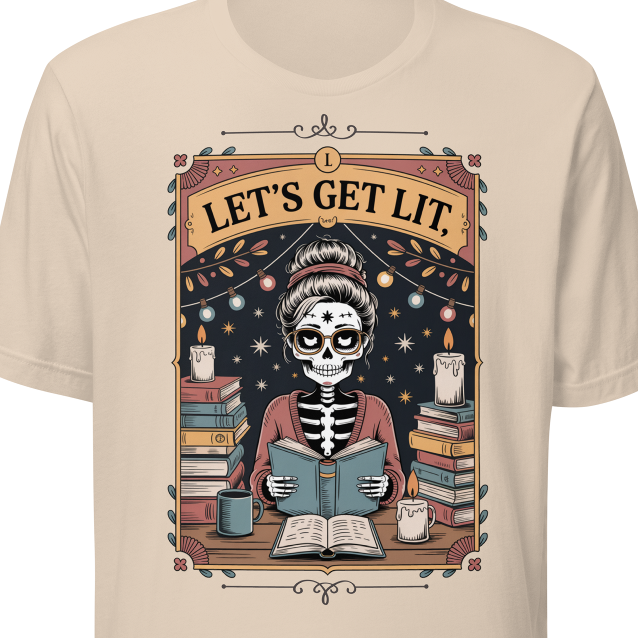 Cream t-shirt with a skeleton reading a book design and 'Let's Get Lit' text