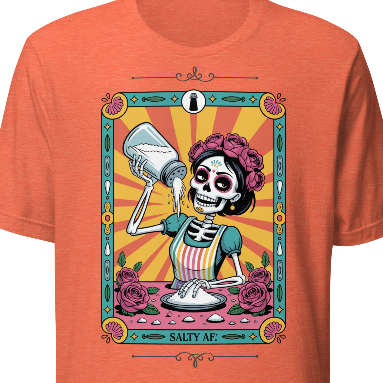 Orange t-shirt with a colorful graphic of a skeleton shaking salt, surrounded by roses and the text 'Salty AF'.