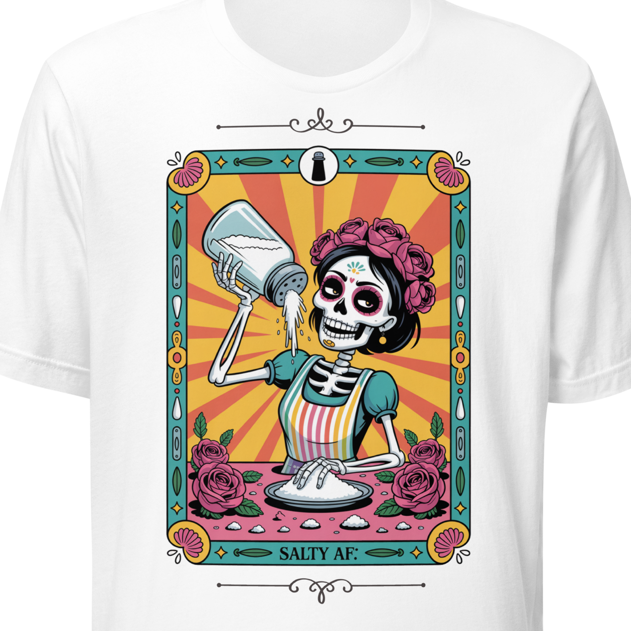 White t-shirt with a colorful graphic design featuring a skeleton, roses, and a salt shaker.