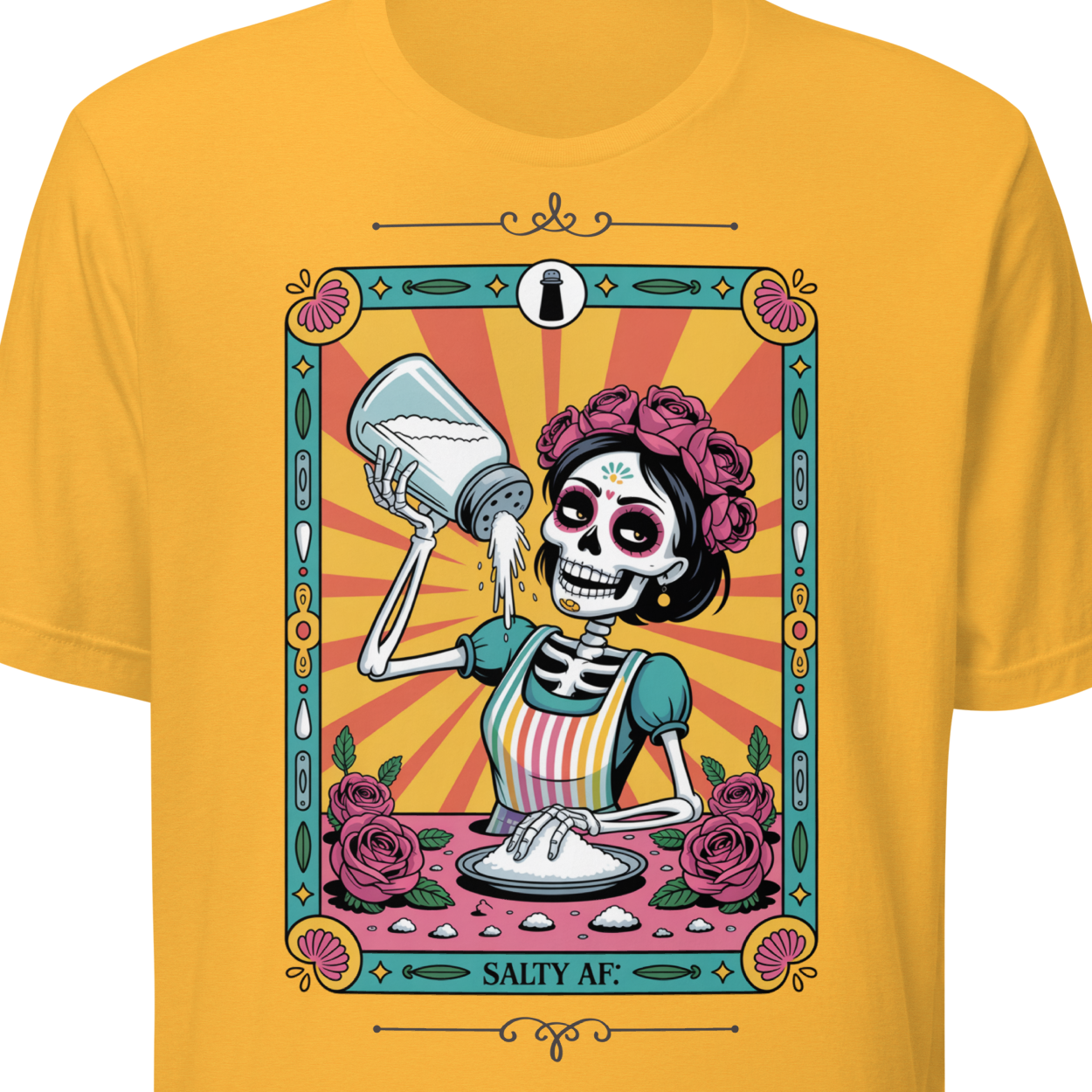 Yellow t-shirt with a colorful graphic of a skeleton holding a salt shaker, surrounded by roses.