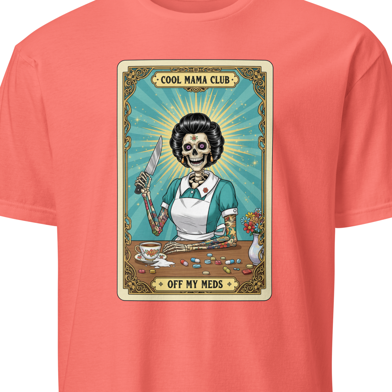 Coral t-shirt with a graphic design featuring a skeleton in a kitchen setting 