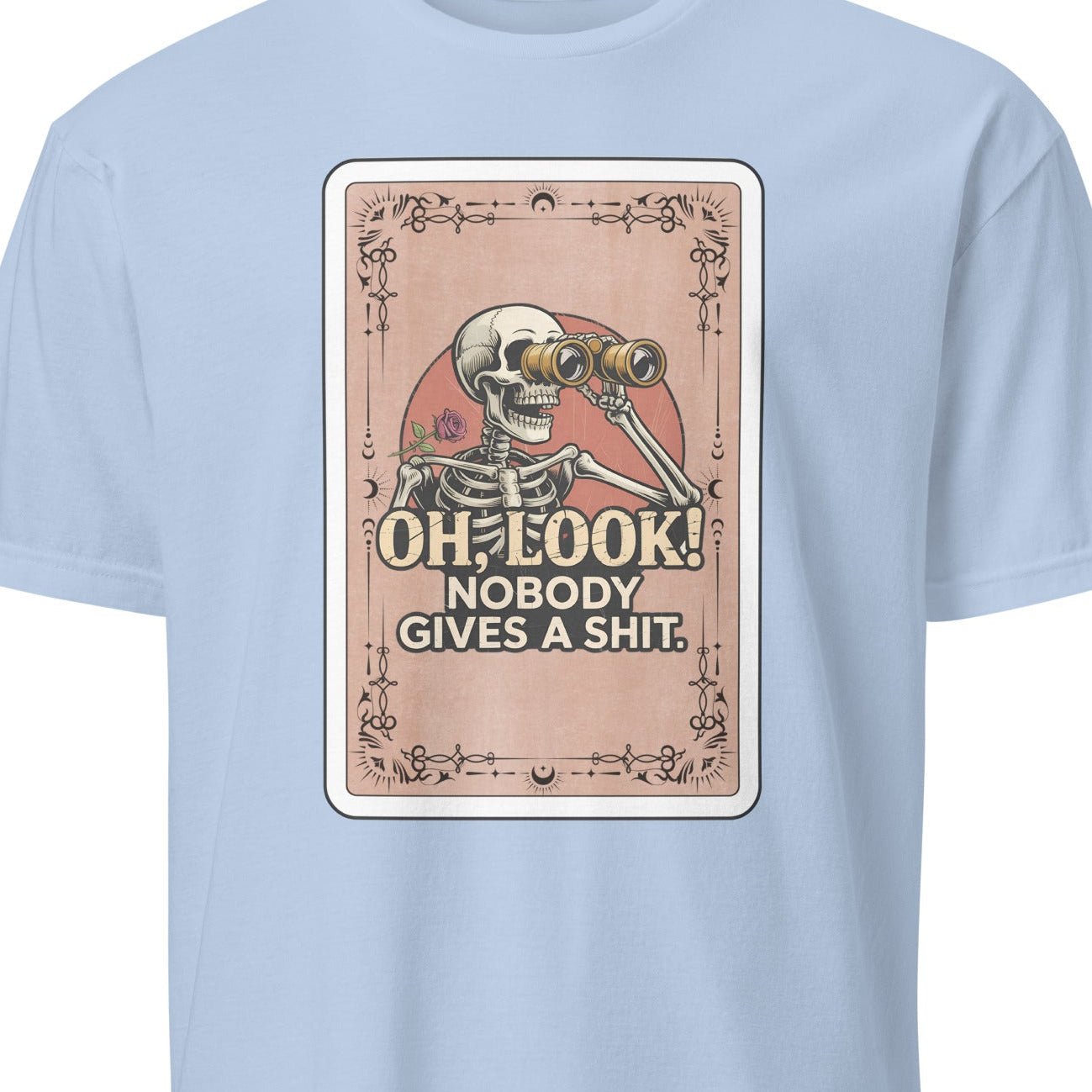 Light blue t-shirt with a graphic design featuring a skeleton and text on a white background