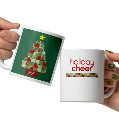 Two hands holding mugs with Christmas-themed designs on a white background