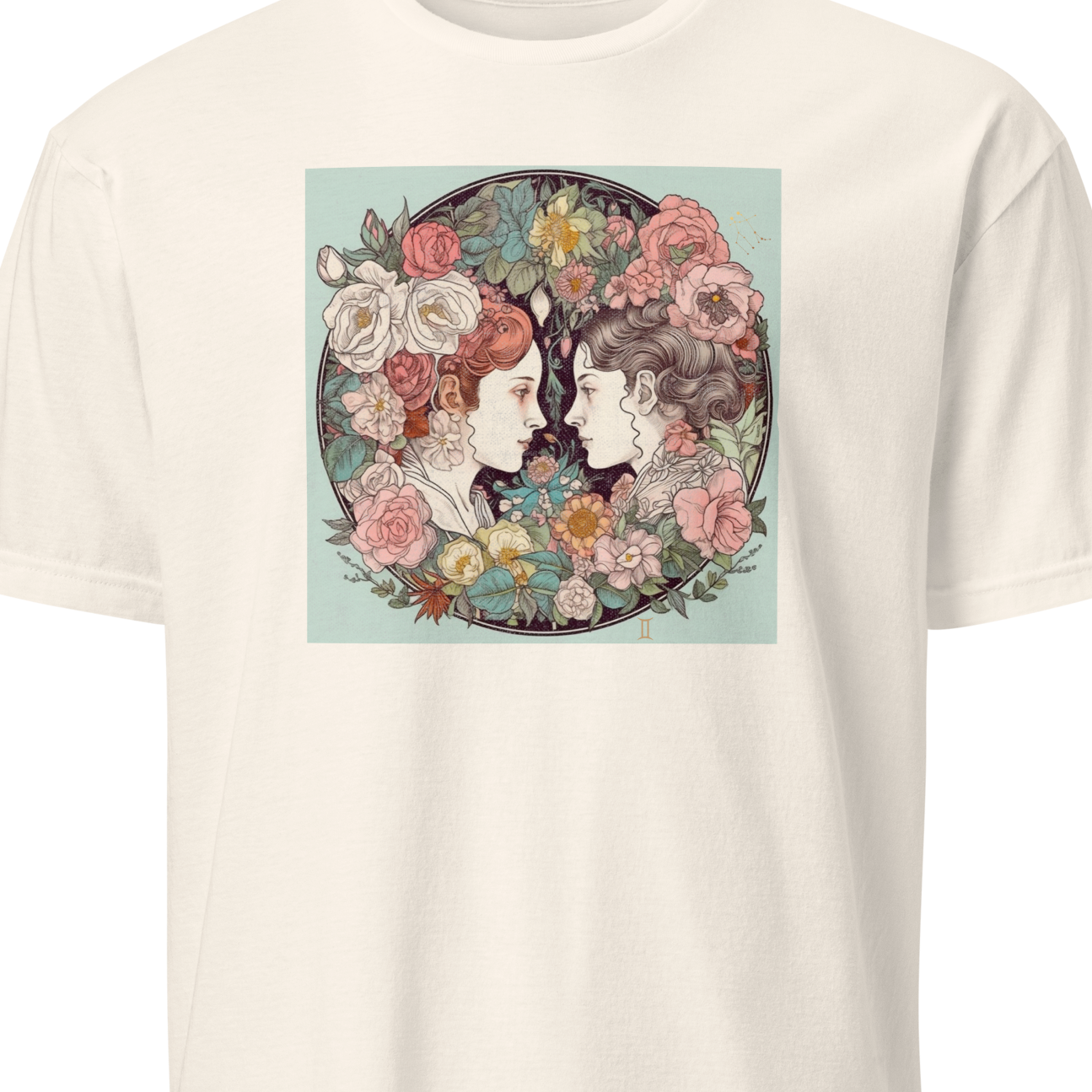 T-shirt with a graphic of two women's faces surrounded by flowers on a white background