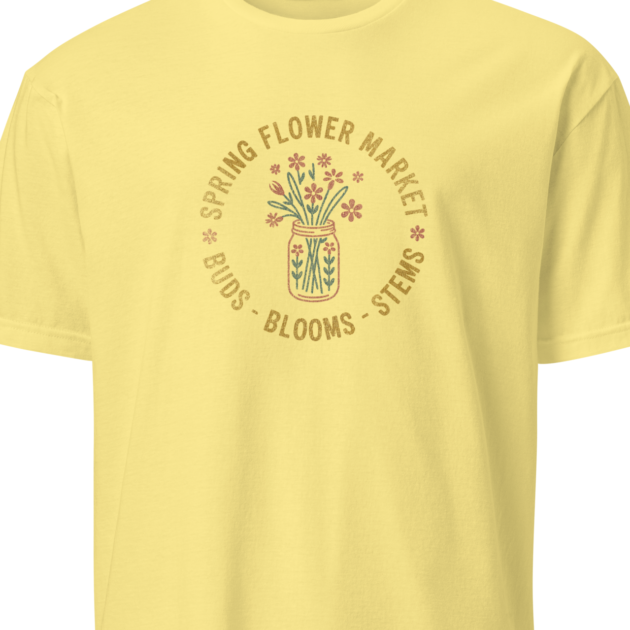 Yellow t-shirt with a floral design and text 