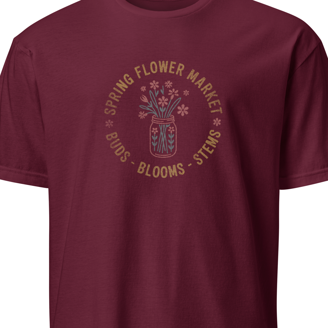 Maroon t-shirt with floral market graphic on a white background