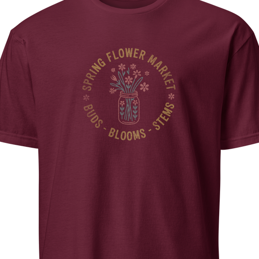 Maroon t-shirt with floral market graphic on a white background