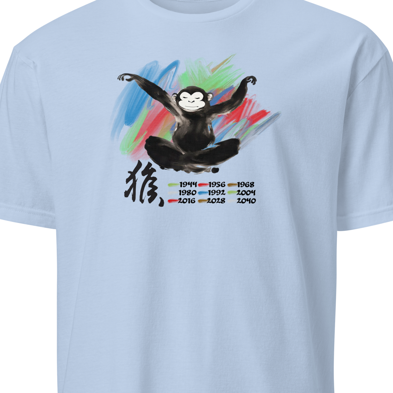 Light blue t-shirt with a monkey graphic and colorful elements 