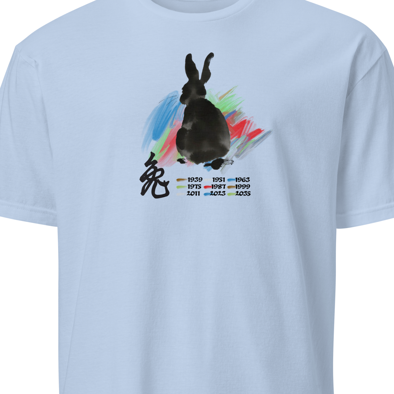 Light blue t-shirt with a black rabbit graphic and colorful splash design