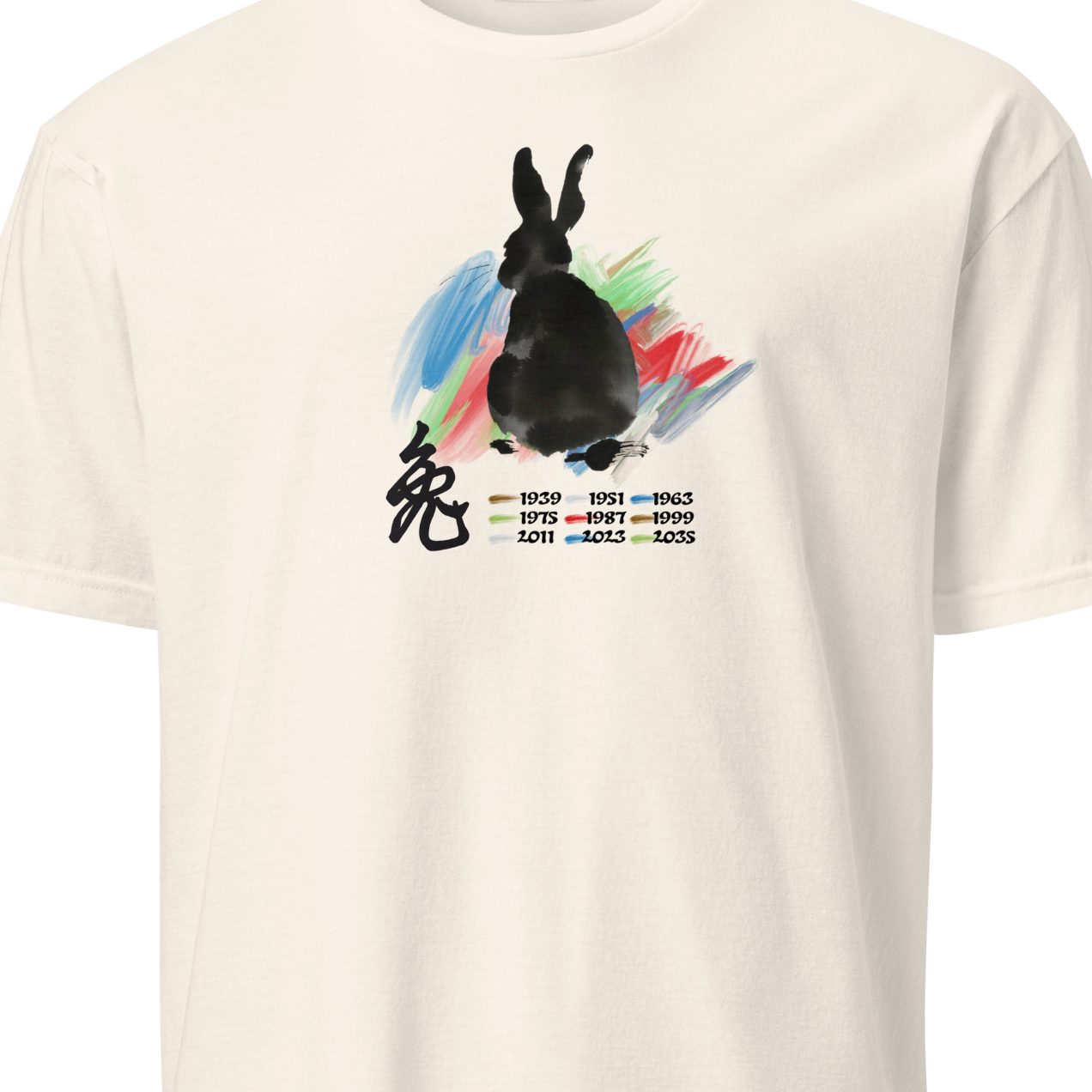 White t-shirt with a black rabbit graphic and colorful splash 