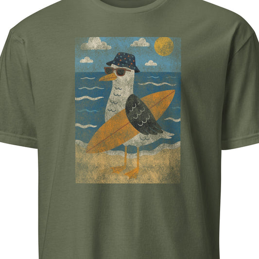 Green t-shirt with a graphic of a bird on a surfboard and beach scene.