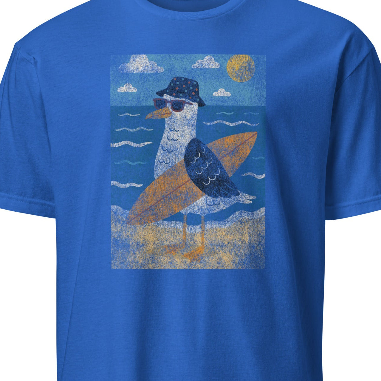 Blue t-shirt with a graphic of a seagull holding a surfboard 