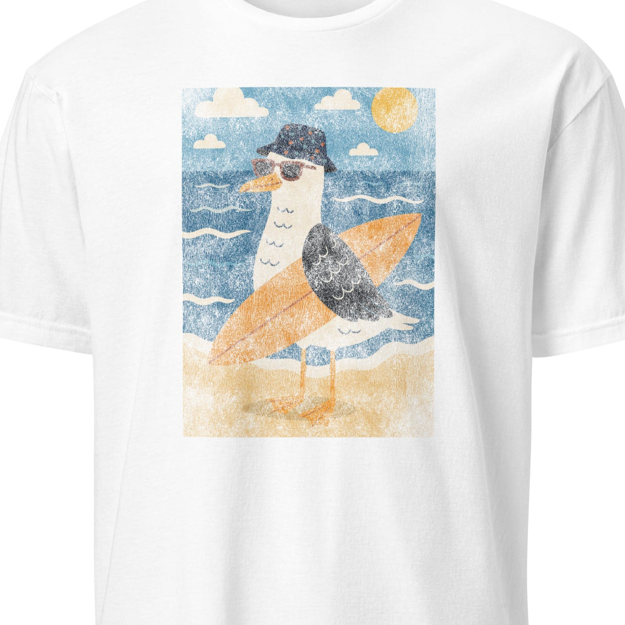 White t-shirt with a graphic of a bird on a beach design.