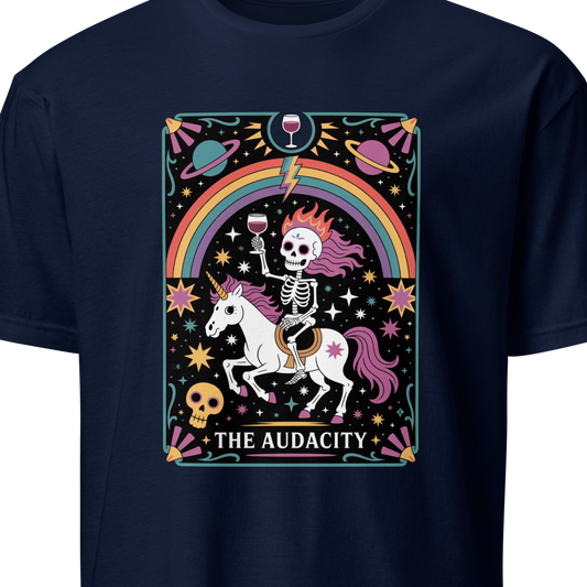 Navy blue t-shirt with a colorful graphic of a skeleton on a unicorn, rainbow, and text 'THE AUDACITY'