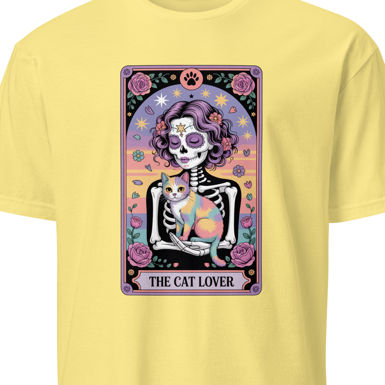 White t-shirt with a colorful graphic of a skeleton holding a cat and the text 'The Cat Lover'.