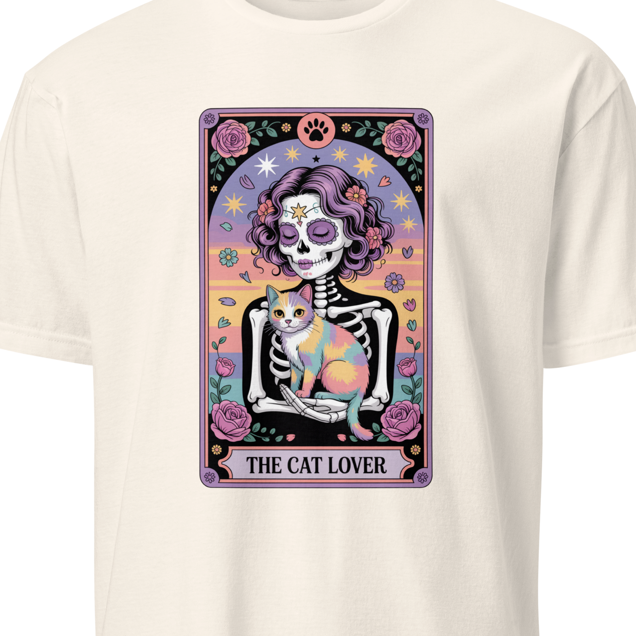 White t-shirt with a colorful graphic of a skeleton holding a cat and the text 'The Cat Lover' 