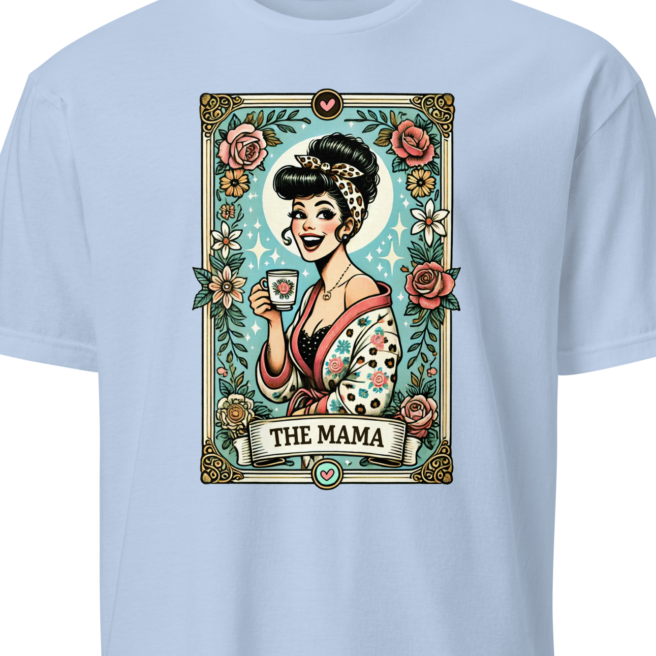 Light blue t-shirt with a graphic design of a woman holding a cup and 'The Mama' text