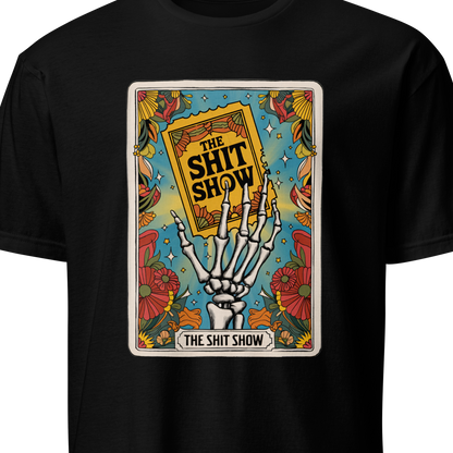 Black t-shirt with a graphic design featuring a skeleton hand holding a book titled 'The Shit Show'