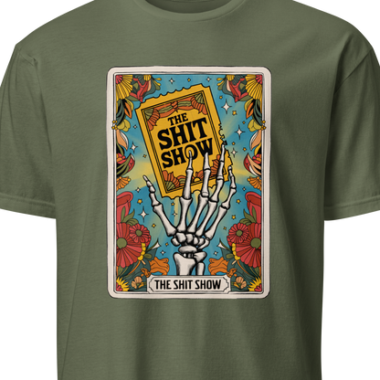 Green t-shirt with a graphic design featuring a skeleton hand holding a book titled 'The Shit Show' 