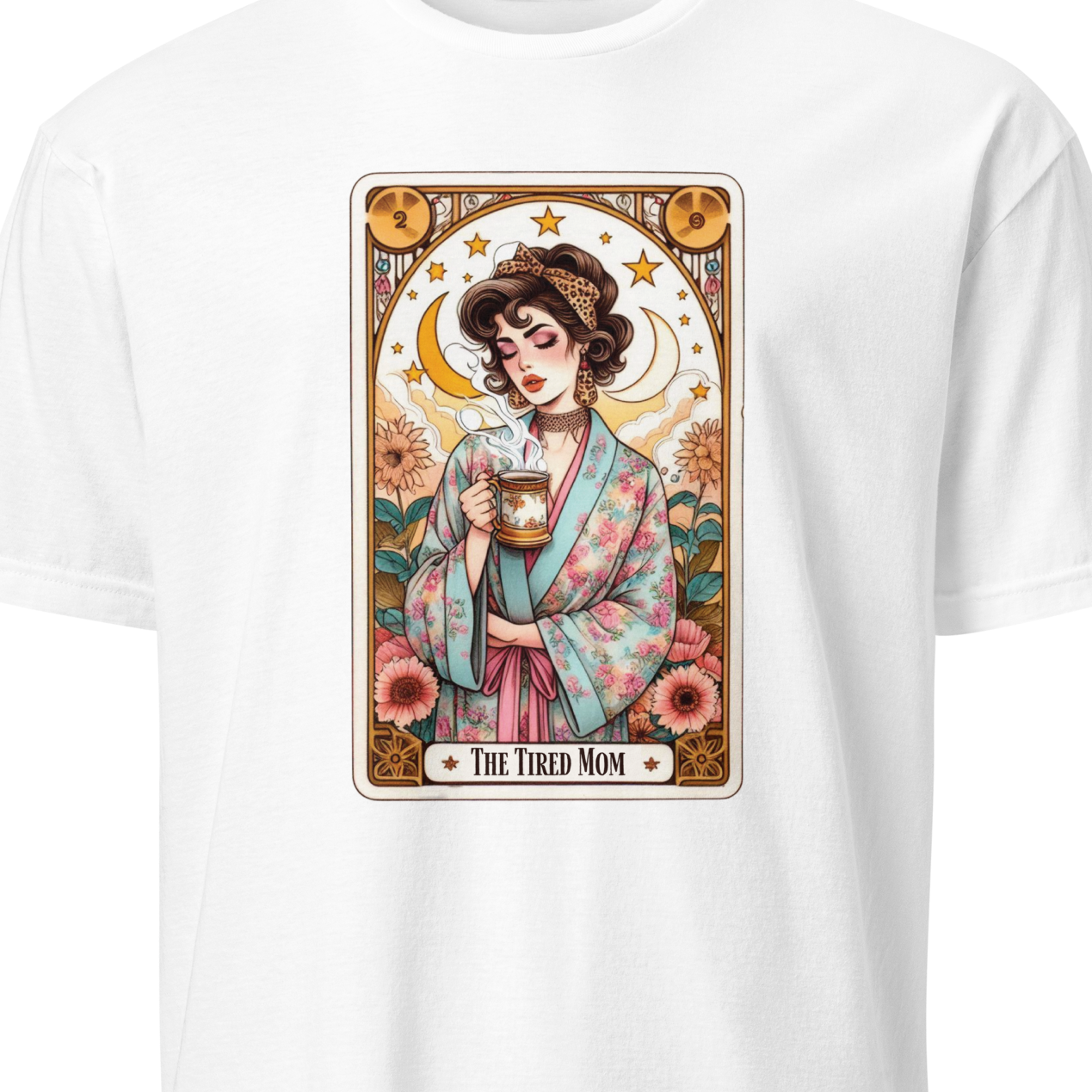 White t-shirt with a graphic of a woman holding a cup and text 'The Tired Mom' 