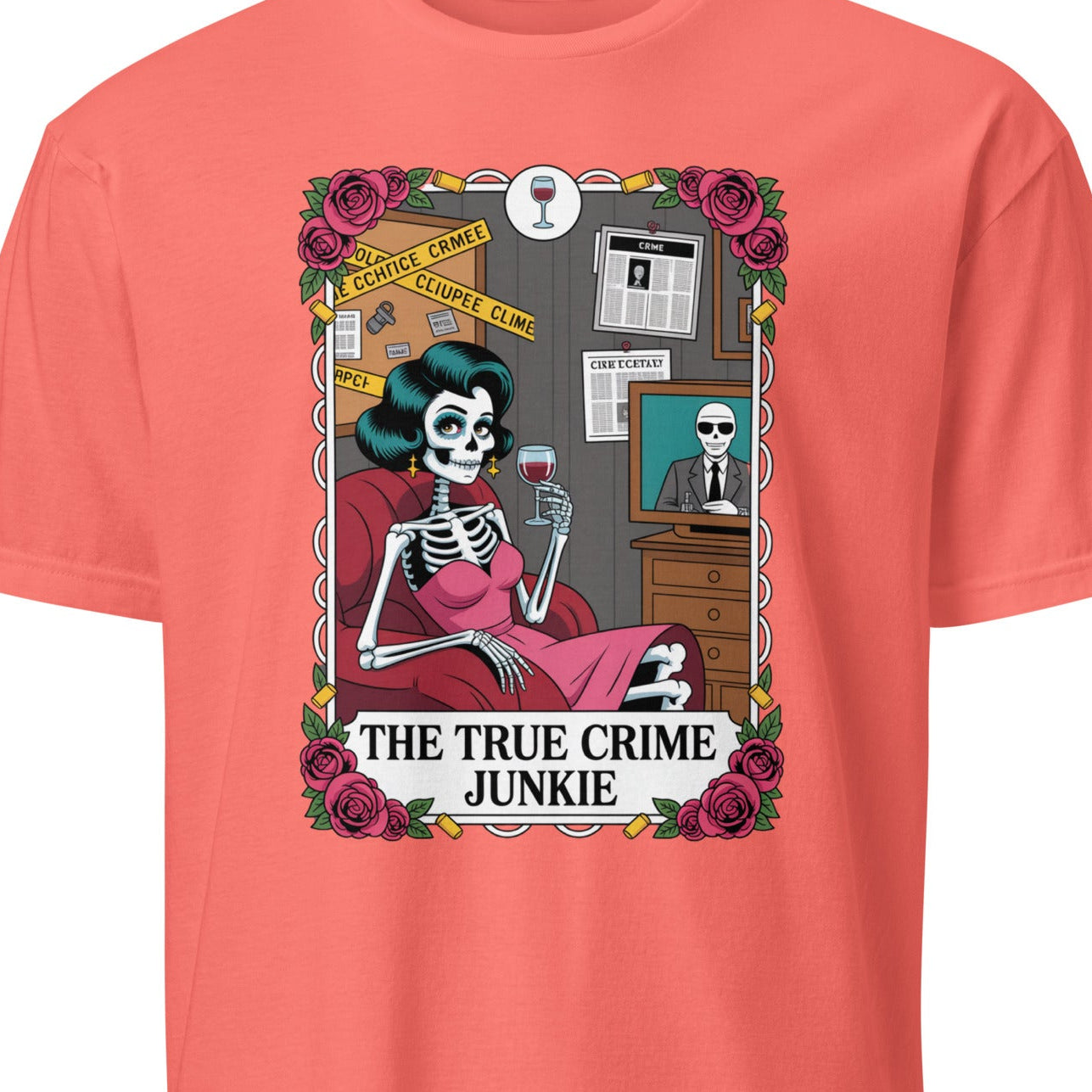 Coral t-shirt with a graphic of a skeleton and text 'The True Crime Junkie' 