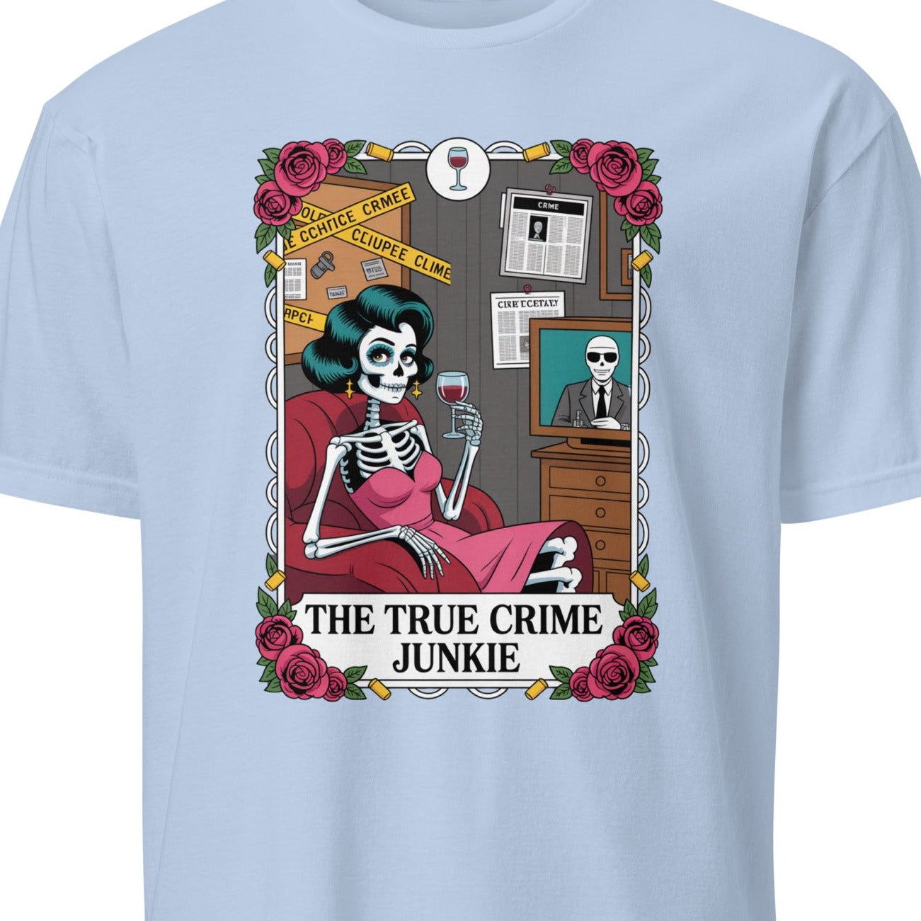 Light blue t-shirt with a graphic of a skeleton and text 'The True Crime Junkie' 